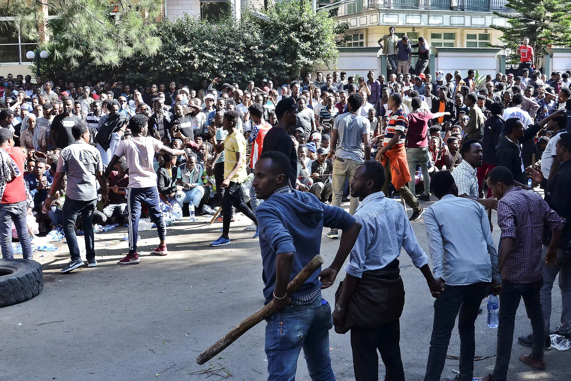 Supporters of Jawar Mohammed gather outside his home in the Ethiopian capital, Addis Ababa on Oct.&nbsp;24.