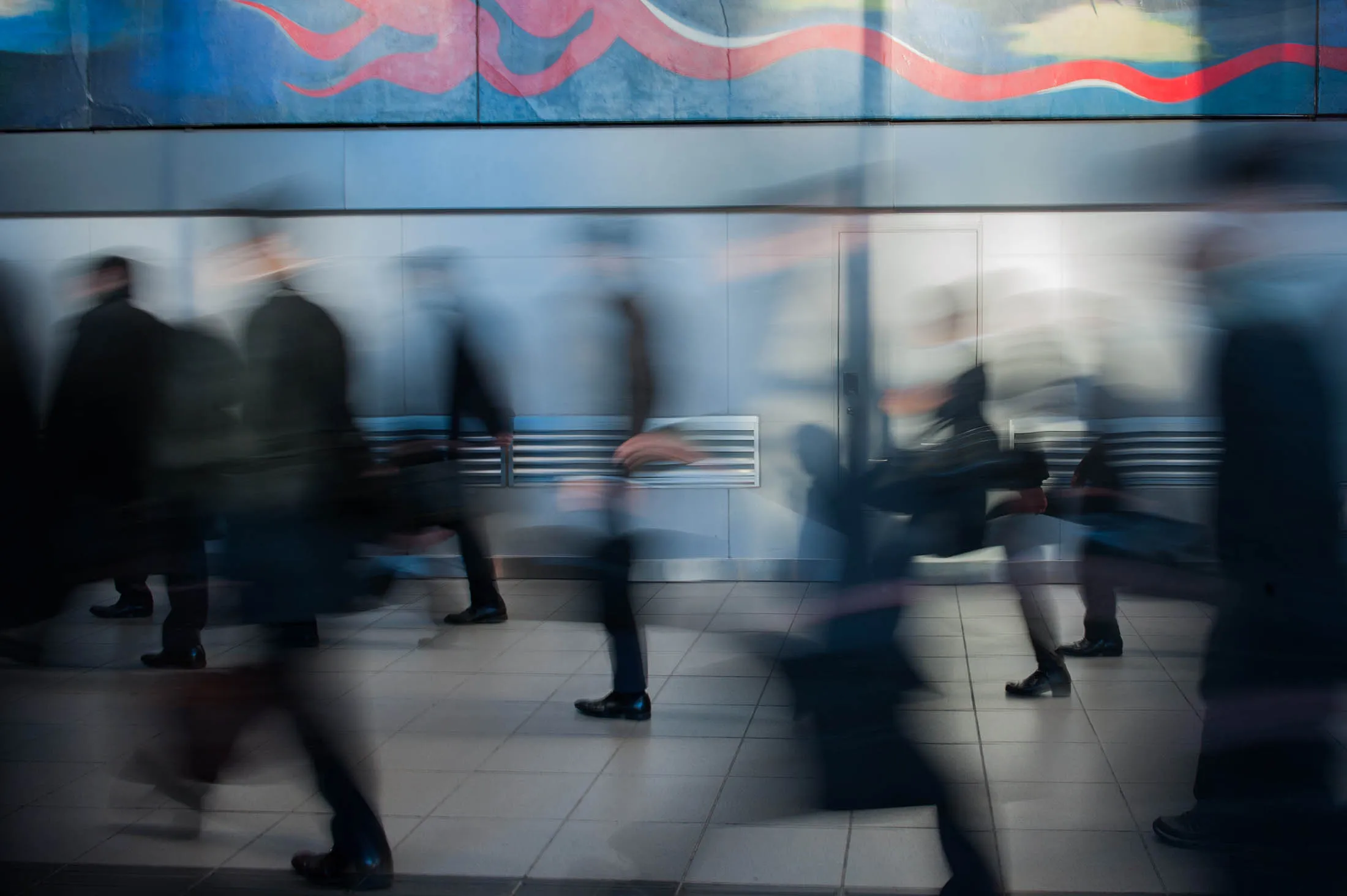 Morning commuters walk inside Shibuya Station in Tokyo, Japan, on Monday, Dec. 10, 2012. Japan's economy shrank in the last two quarters, meeting the textbook definition of a recession, as the dispute with China, the country's biggest export market, caused consumers there to shun Japanese products and contributed to Japan's worst year for exports since the global recession in 2009.
