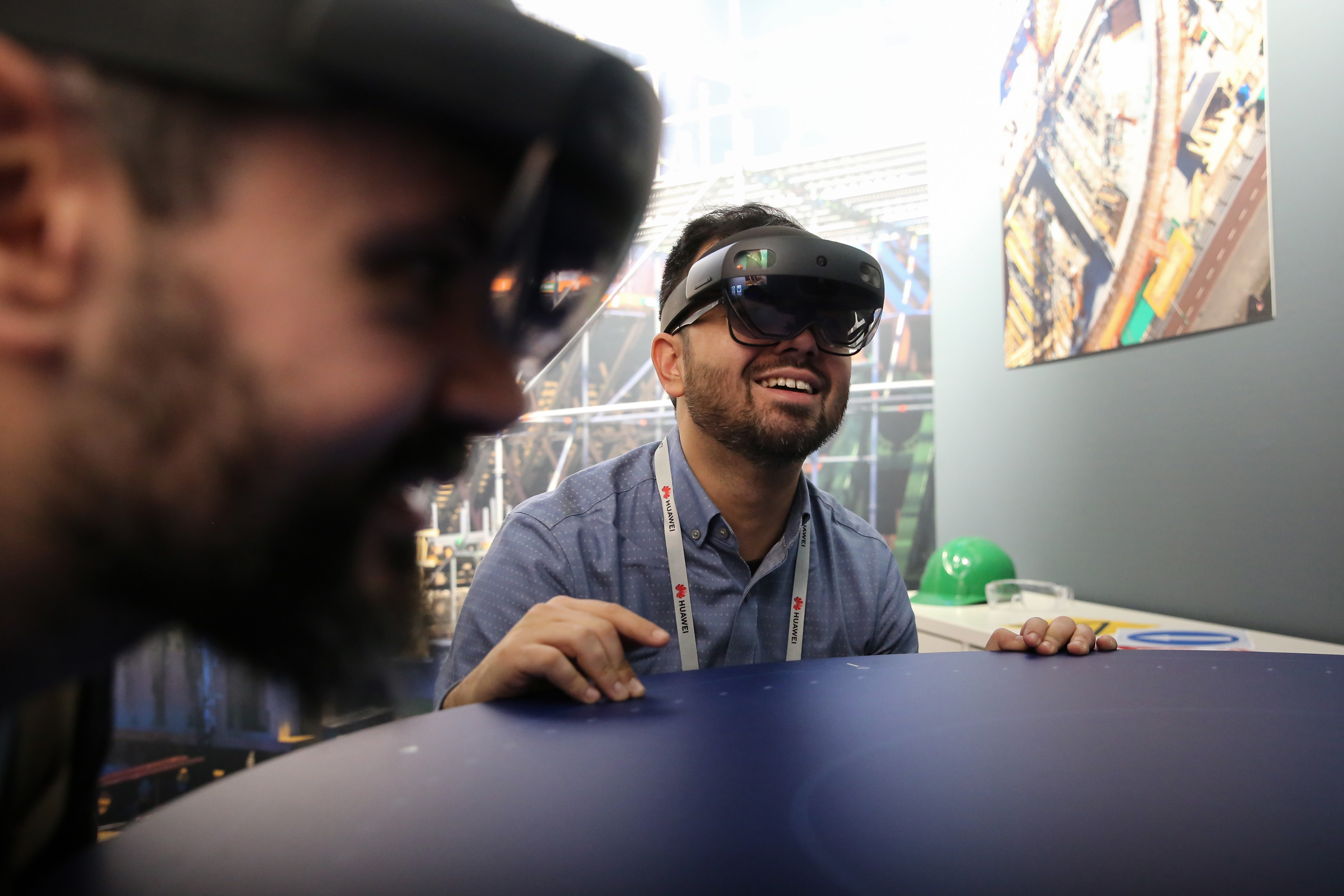 Attendees use the Bentley Systems Inc. Synchro XR augmented reality app with&nbsp;HoloLens 2 headsets.