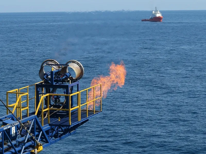 A flare is seen as gas from methane hydrate was produced from drilling in Japan.