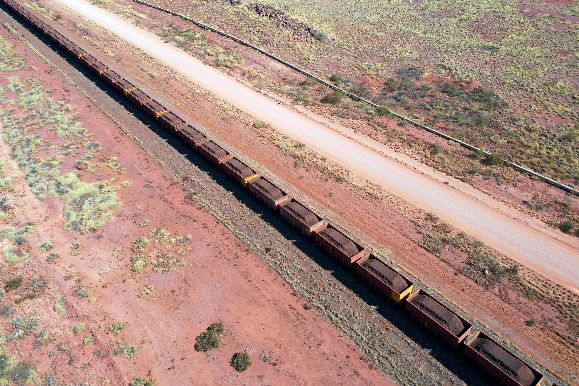 A train carrying iron ore towards a Rio Tinto Group port facility in Karratha.