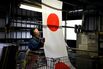 Manufacturing of Japanese National Flags As GDP Tops Forecasts