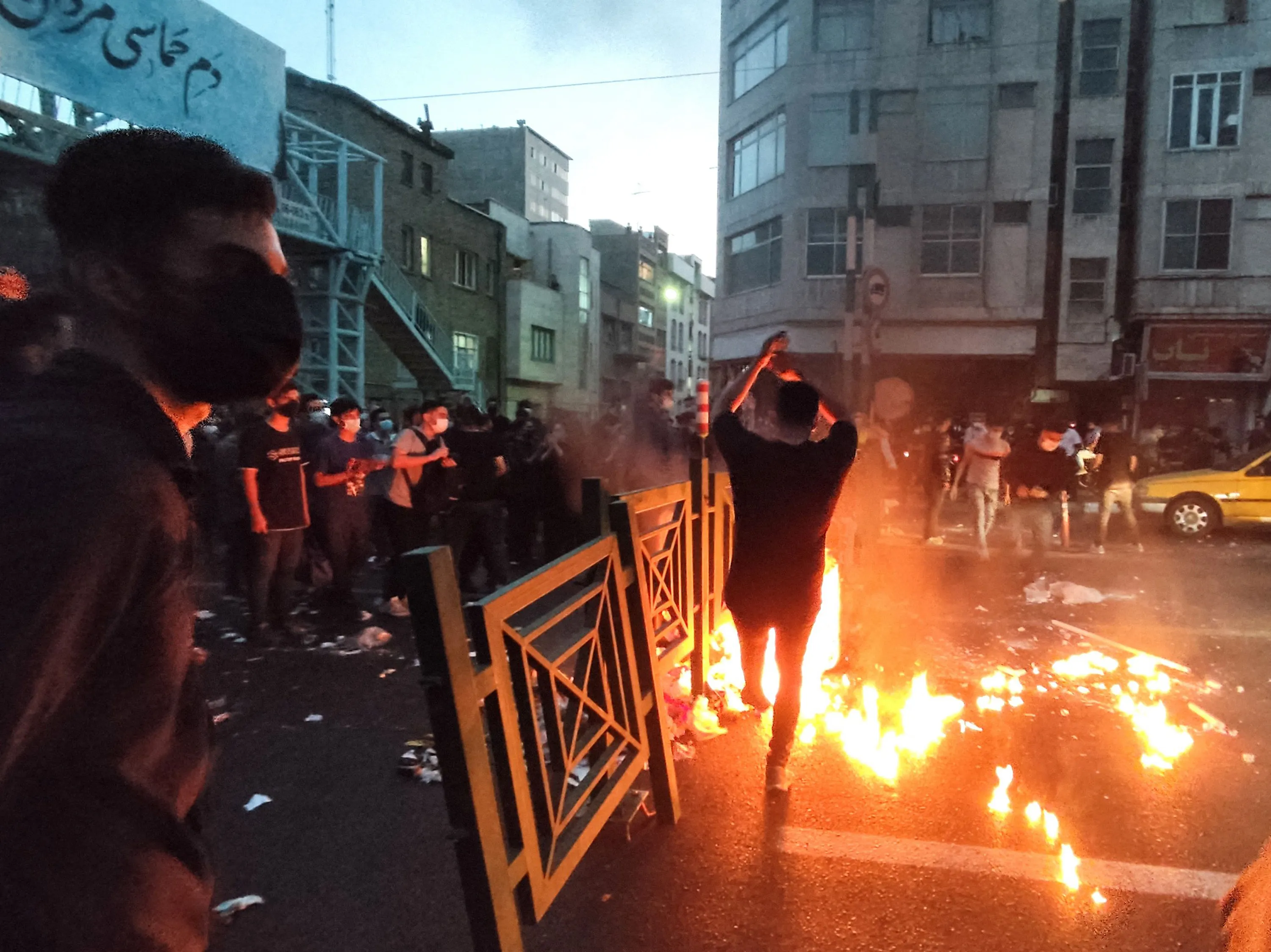 Demonstrators protest following the death of Mahsa Amini in Tehran&nbsp;on Sept. 21.