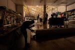 People work during a load-shedding power outage in Cape Town, South Africa.