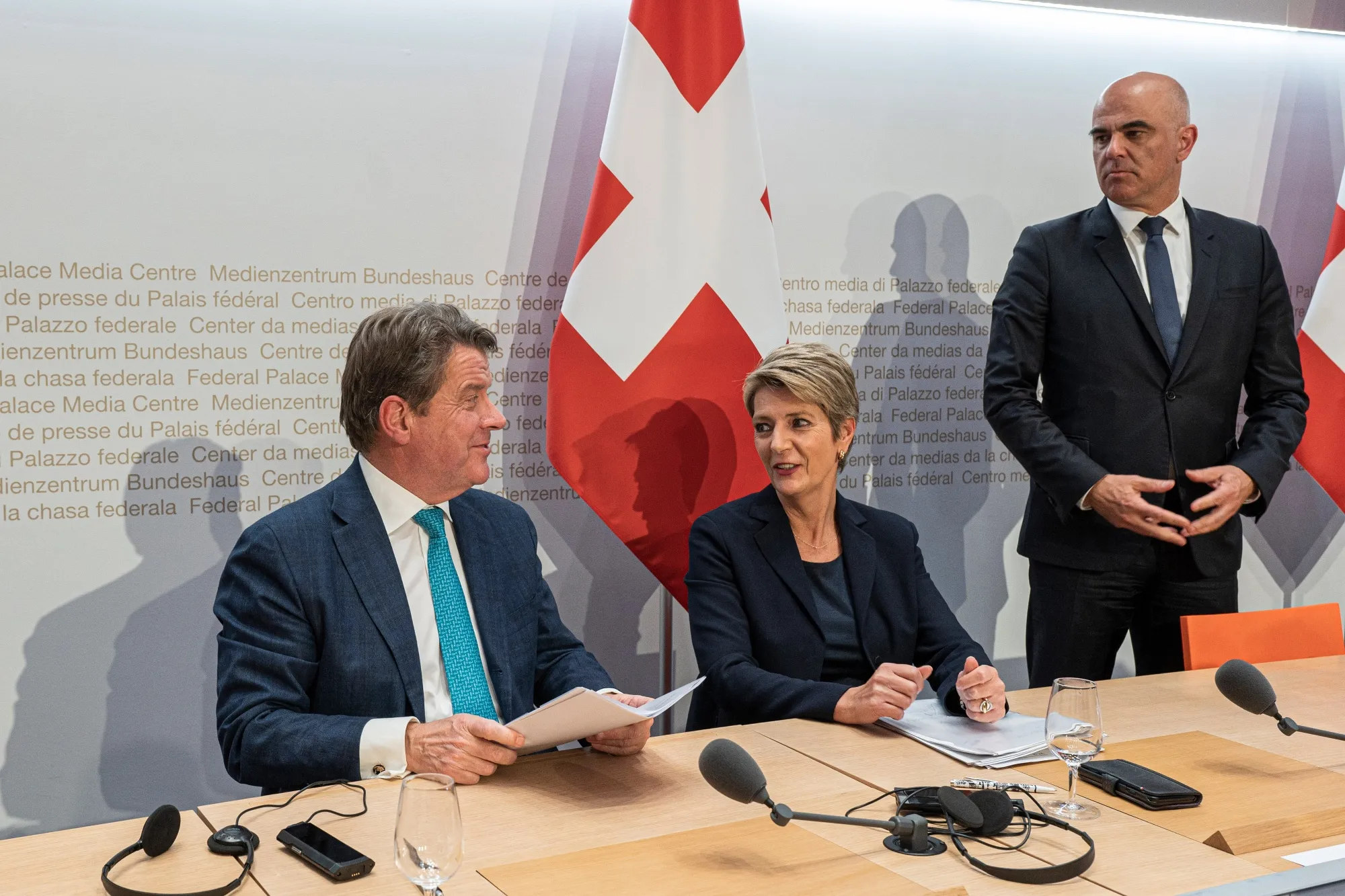 Colm Kelleher, chairman of UBS Group AG, left, Karin Keller-Sutter, Switzerland's finance minister, center, and Alain Berset, Switzerland's president