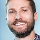 Headshot of Andrew J Quigg