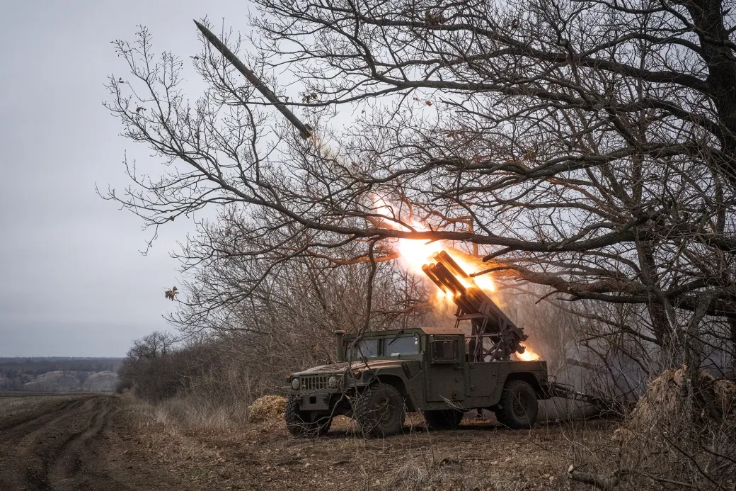Ukrainian soldiers operate a Humvee fitted with a Grad launcher fires&nbsp;in the direction of Toretsk, Ukraine, on Jan. 23.&nbsp;