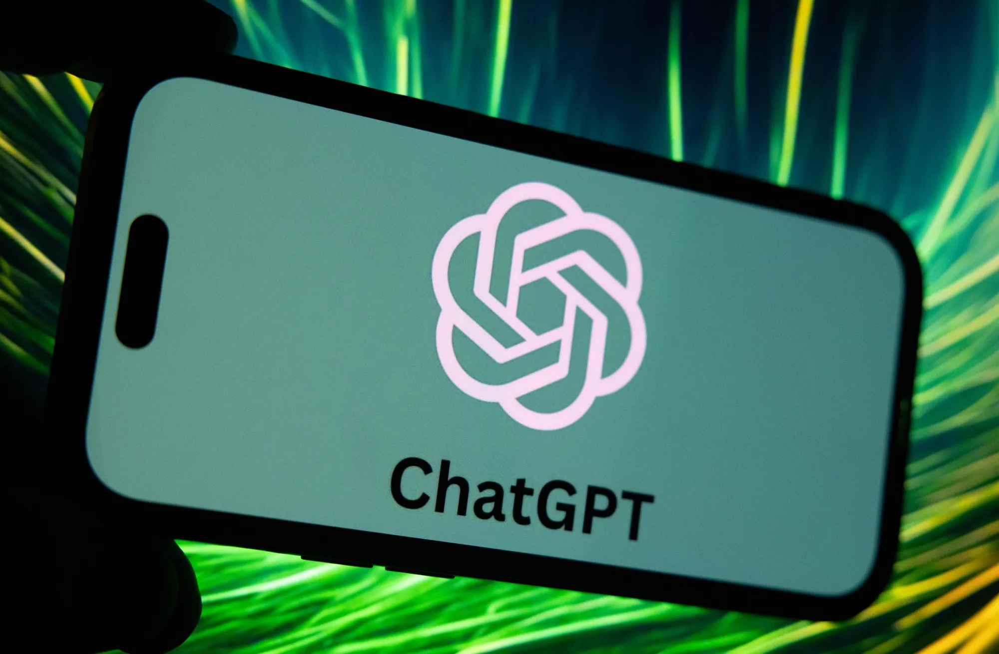 The ChatGPT virtual assistant logo on a smartphone.