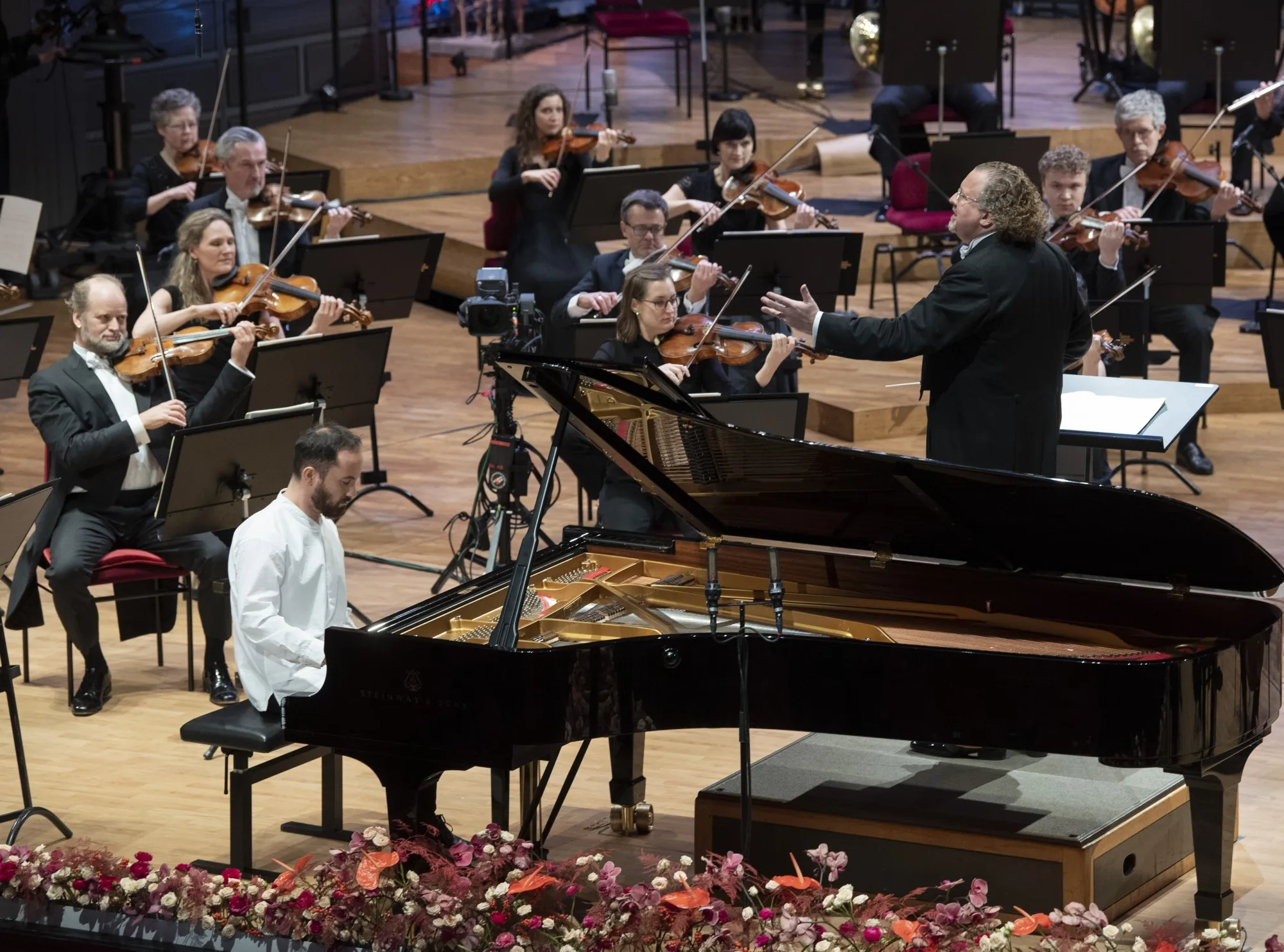 Russian-German pianist Igor Levit and French conductor Stephane Deneve with the Royal Stockholm Philharmonic Orchestra perform Beethoven's Piano Concerto No. 5 (Emperor Concerto) during the televised Nobel Prize Concert 2020 at the Stockholm Concert Hall, in Stockholm, Sweden, on Dec. 8, 2020. Levit will perform Shostakovich’s 24 “Preludes and Fugues" at Carnegie Hall on Tuesday night, part of a quick U.S. tour that takes him to the Kennedy Center in Washington, D.C., on Thursday and Clayton State University in Morrow, Georgia, on Sunday. (Fredrik Sandberg/TT News Agency via AP, File)