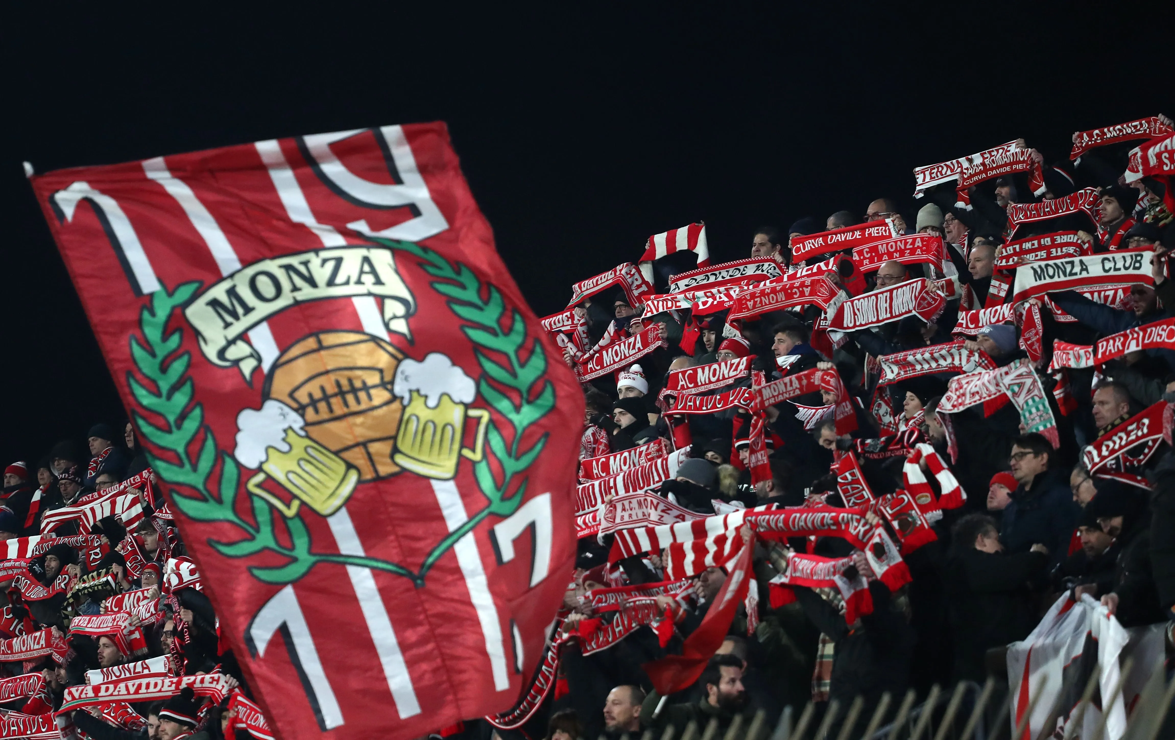 Fans of AC Monza during a match at U-Power Stadium in Monza, Italy.
