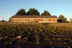 A disused customs control point sits boarded-up at the border between Northern Ireland and Ireland, near Dundalk in Ireland.