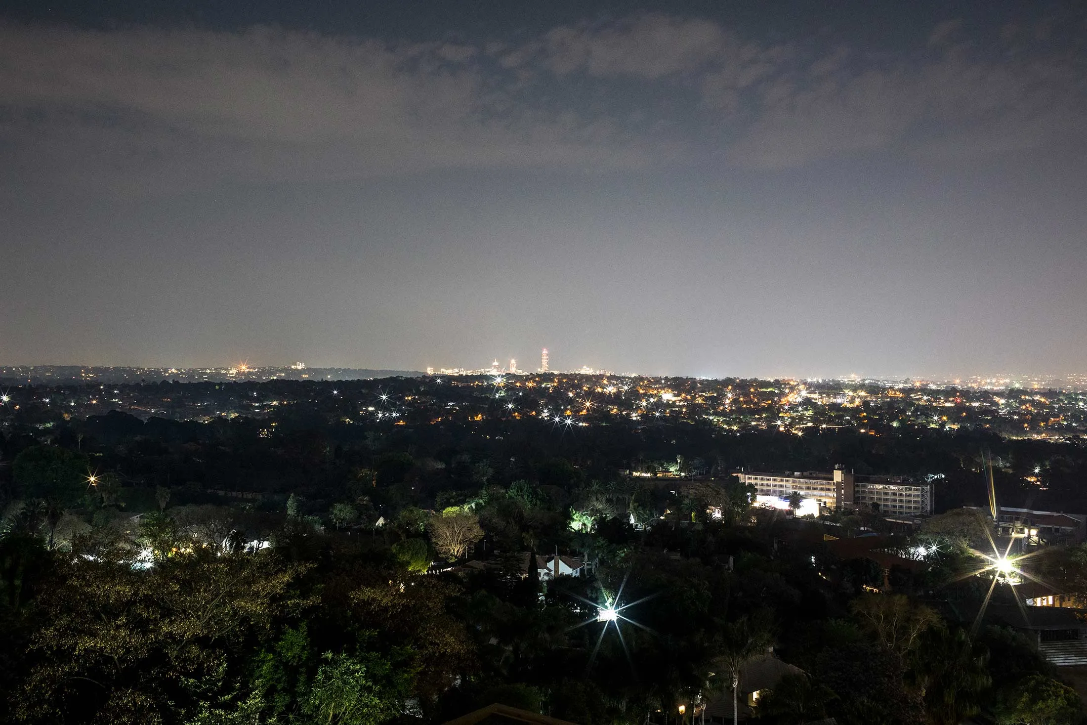 A view of Johannesburg shows&nbsp;Sandton, Africa’s richest square mile,&nbsp;on the horizon. But suburbs on the left and foreground remain in darkness.&nbsp;