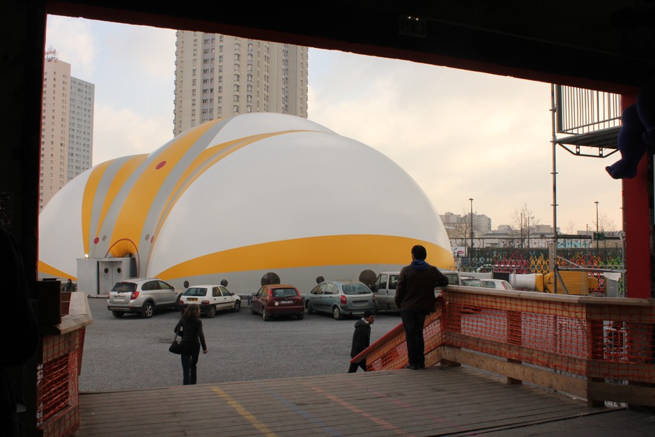 The &quot;bubble,&quot; the inflatable structure where new arrivials are interviewed, viewed from the living area of the welcome center for migrants. 