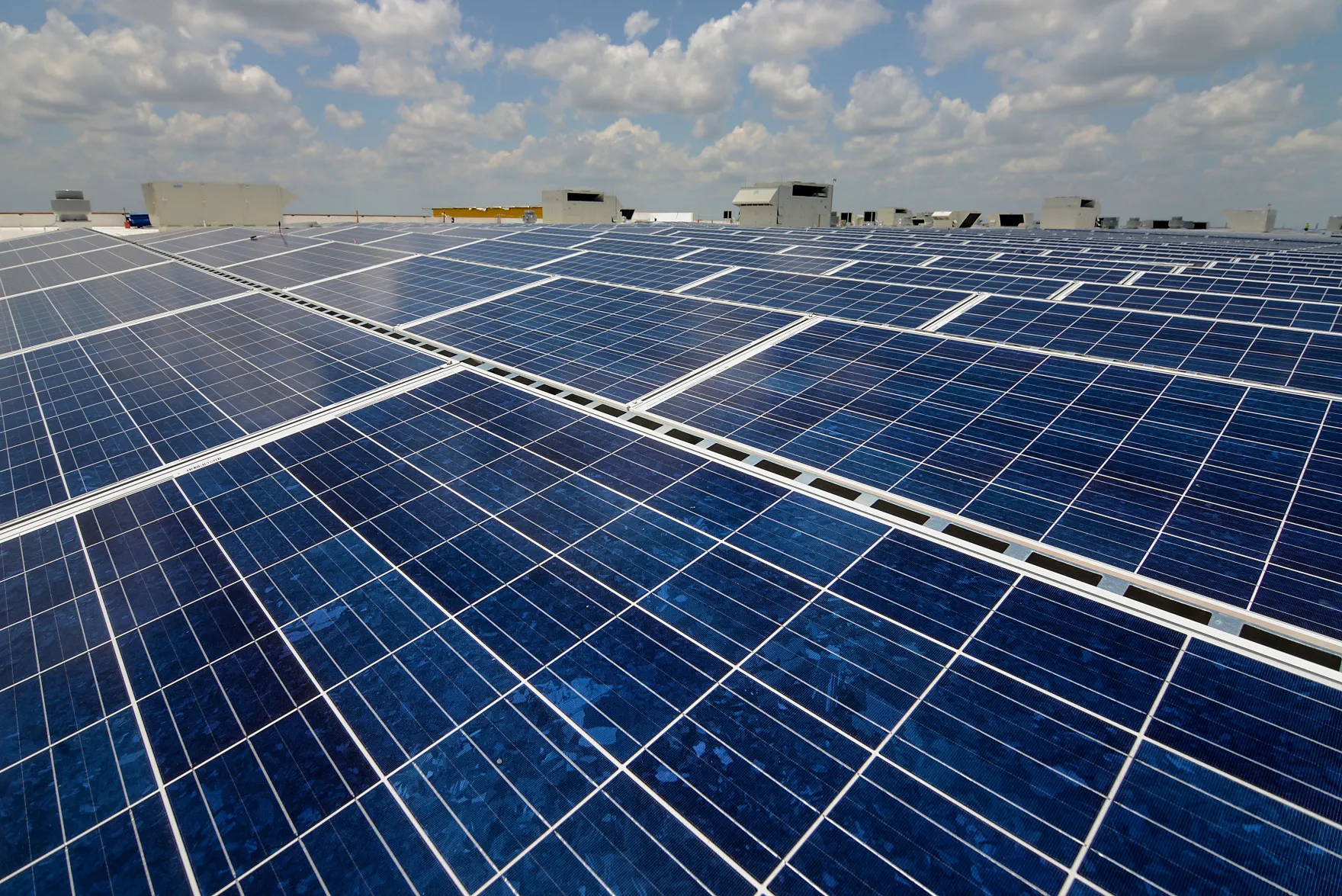 Solar panels stand on the roof of a new IKEA store in Miami, Florida, U.S., on&nbsp;May 20, 2014.