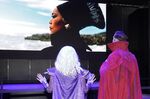 Cosplayers watch a Black Panther: Wakanda Forever trailer at the Marvel Comics exhibit at the D23 Expo Saturday, Sept. 10, 2022, in Anaheim, Calif. (AP Photo/Mark J. Terrill)