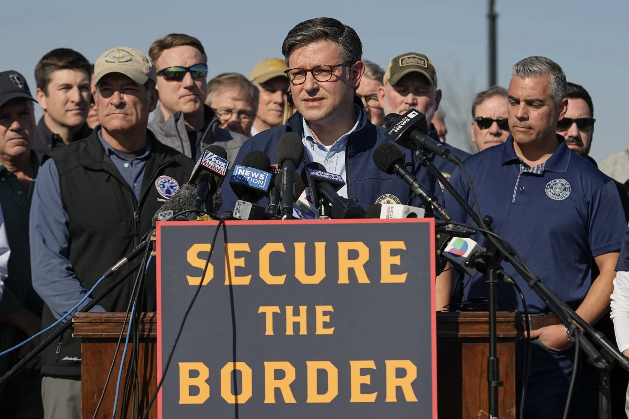 Mike Johnson speaks with Republican members of Congress in Eagle Pass, Texas on Jan. 3.&nbsp;