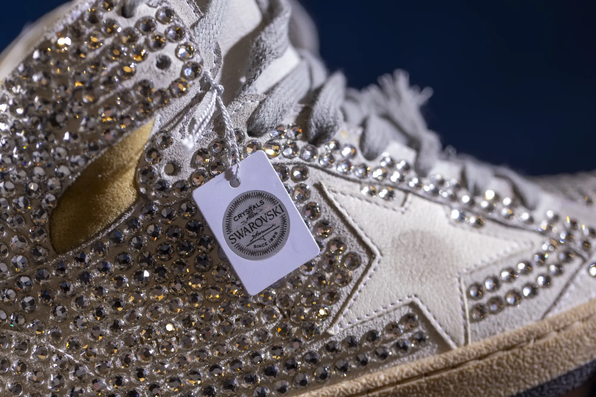 A pair of Swarovski jewel-encrusted sneakers at a Golden Goose store in the Mayfair district of London, UK, on Dec. 4, 2023.