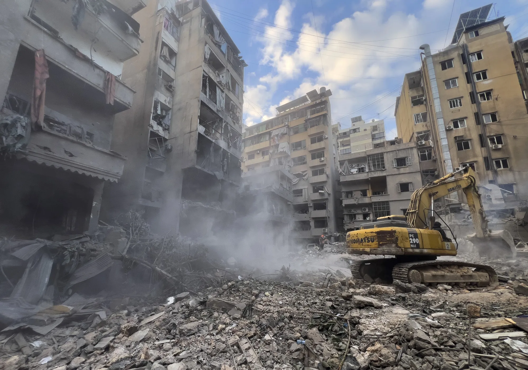 Destroyed buildings as rescue workers search for victims following an airstrike in Beirut, on Oct. 11.