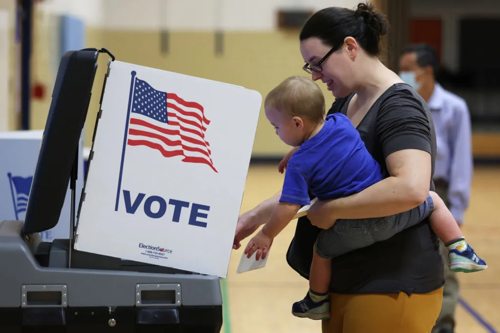 An extremely young voter.