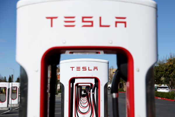 Shares For Companies In Electric Vehicle Sector Rise As Oil Prices Soar