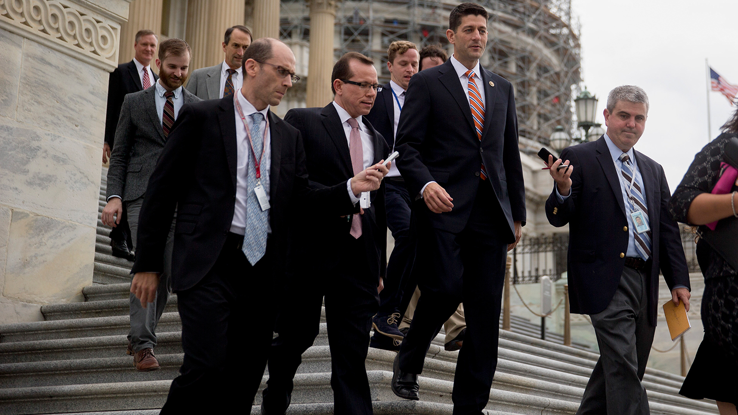 Representative Paul Ryan, center right, walks down the steps of the U.S. Capitol building following a vote on Oct. 9, 2015.
