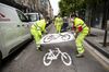 Workers create bicycle lanes