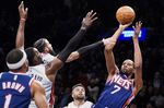 Brooklyn Nets forward Kevin Durant (7) takes a shot in the final seconds of the second half of an NBA basketball game against the Miami Heat, Thursday, March 3, 2022, in New York. (AP Photo/John Minchillo)