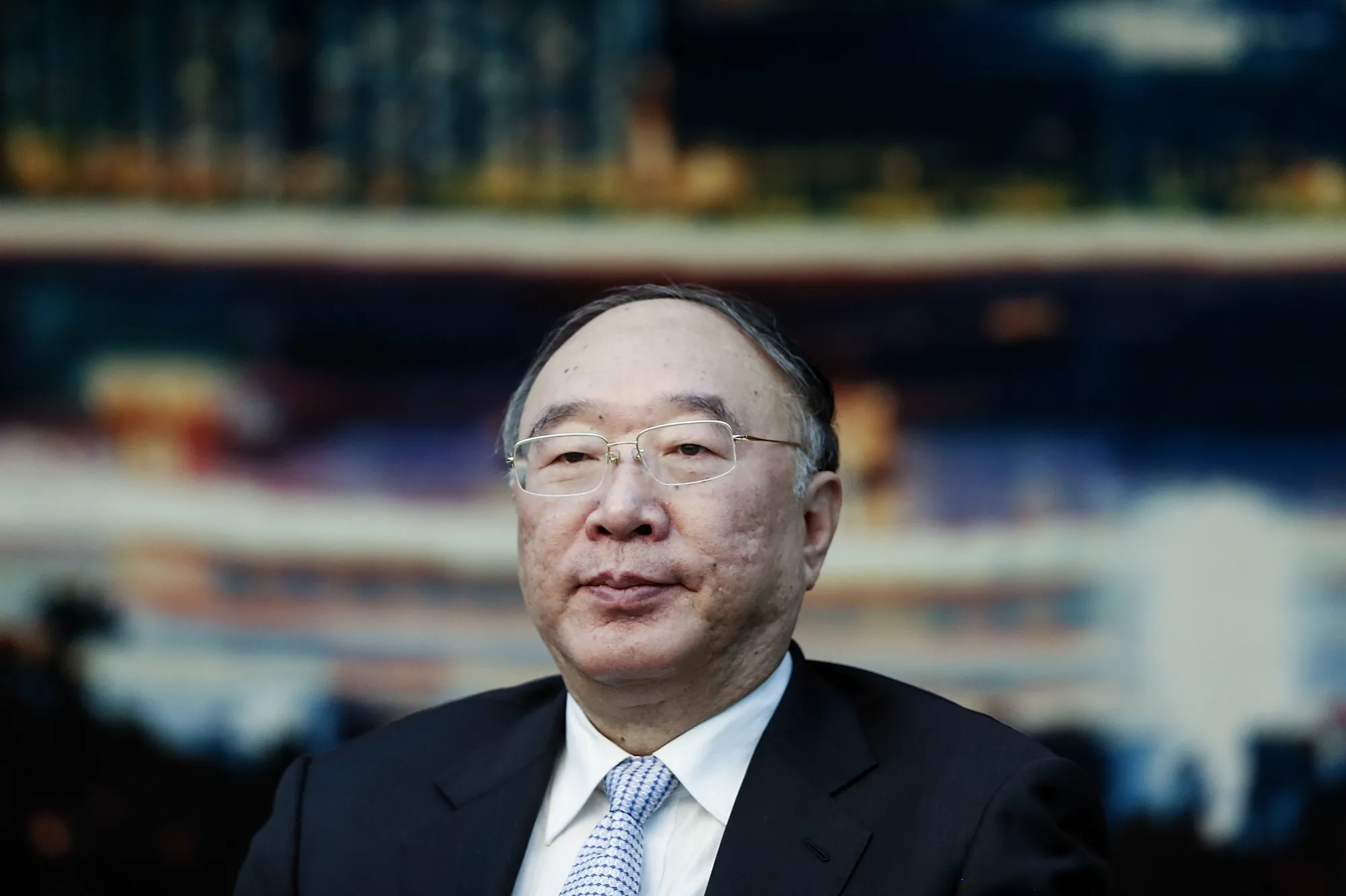 Huang Qifan. Photographer: Lintao Zhang/Getty Images
