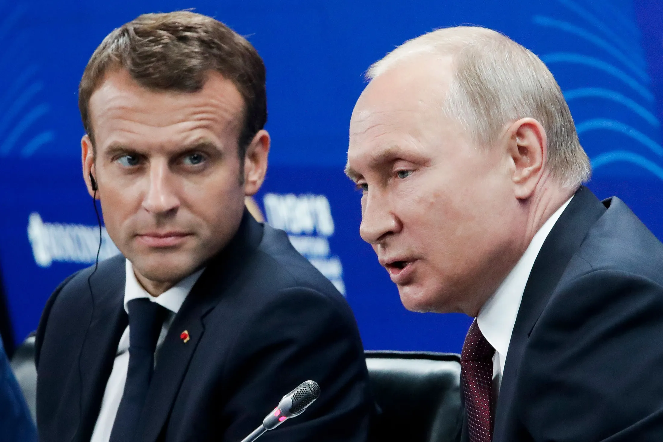Vladimir Putin, right,&nbsp;Emmanuel Macron.