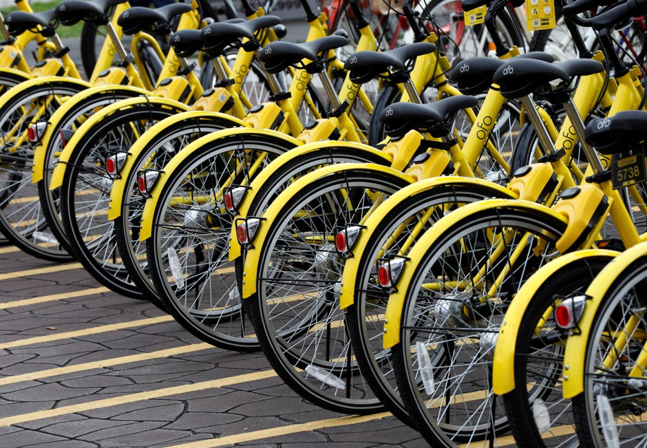 Dockless bikes are moving into many American cities. Who gets to regulate them? 