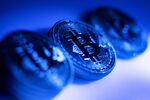 A collection of bitcoin tokens sit in this arranged photograph in London, U.K., on Tuesday, Jan. 9, 2018.