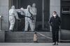 Medical staff carry a patient into the Jinyintan hospital, where patients infected by a mysterious SARS-like virus are being treated, in Wuhan, on Jan. 18.