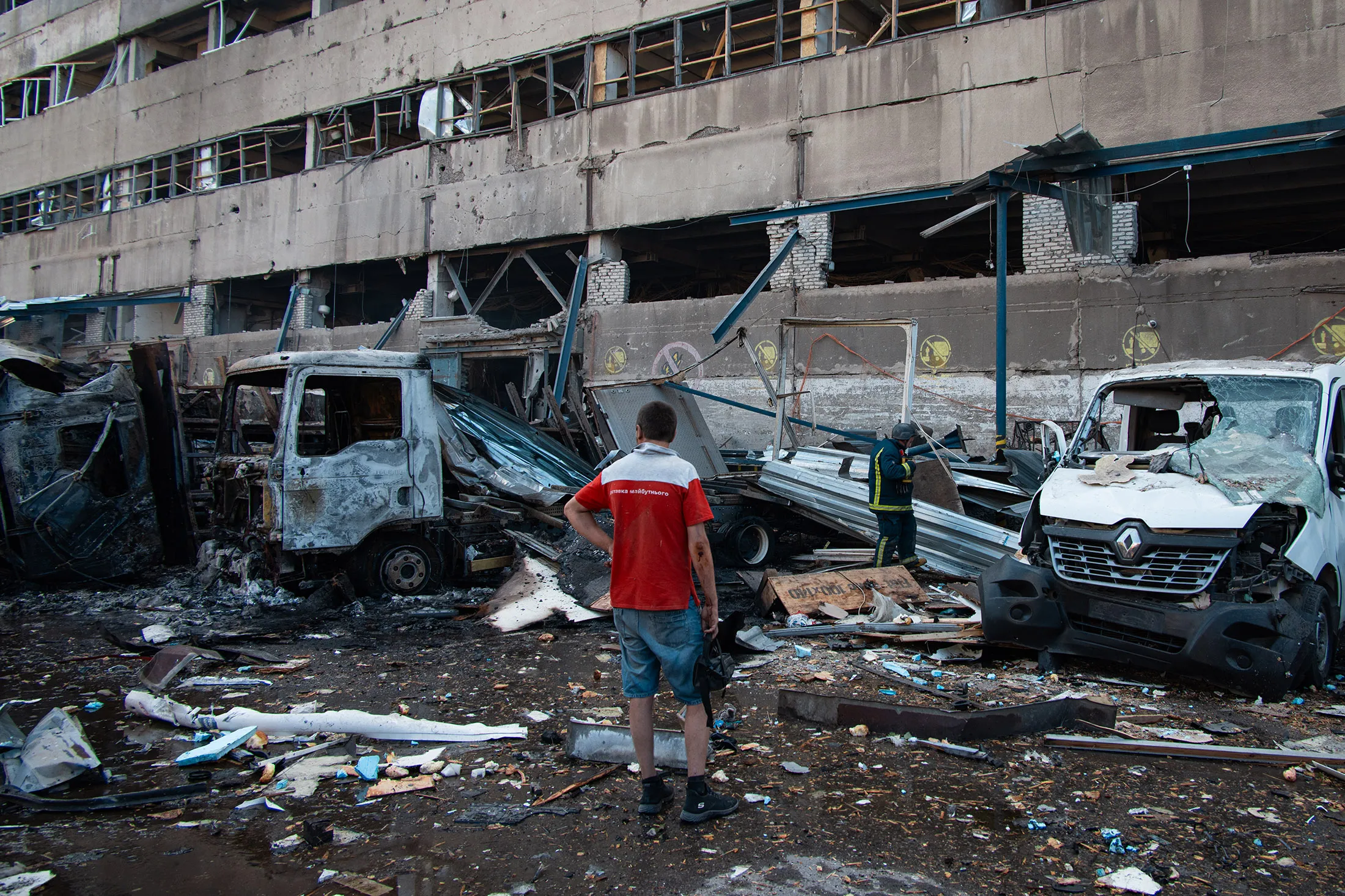 A resident surveys&nbsp;the destruction caused by a Russian&nbsp;missile strike&nbsp;in missile strike in Kharkiv, Ukraine, on June 30.
