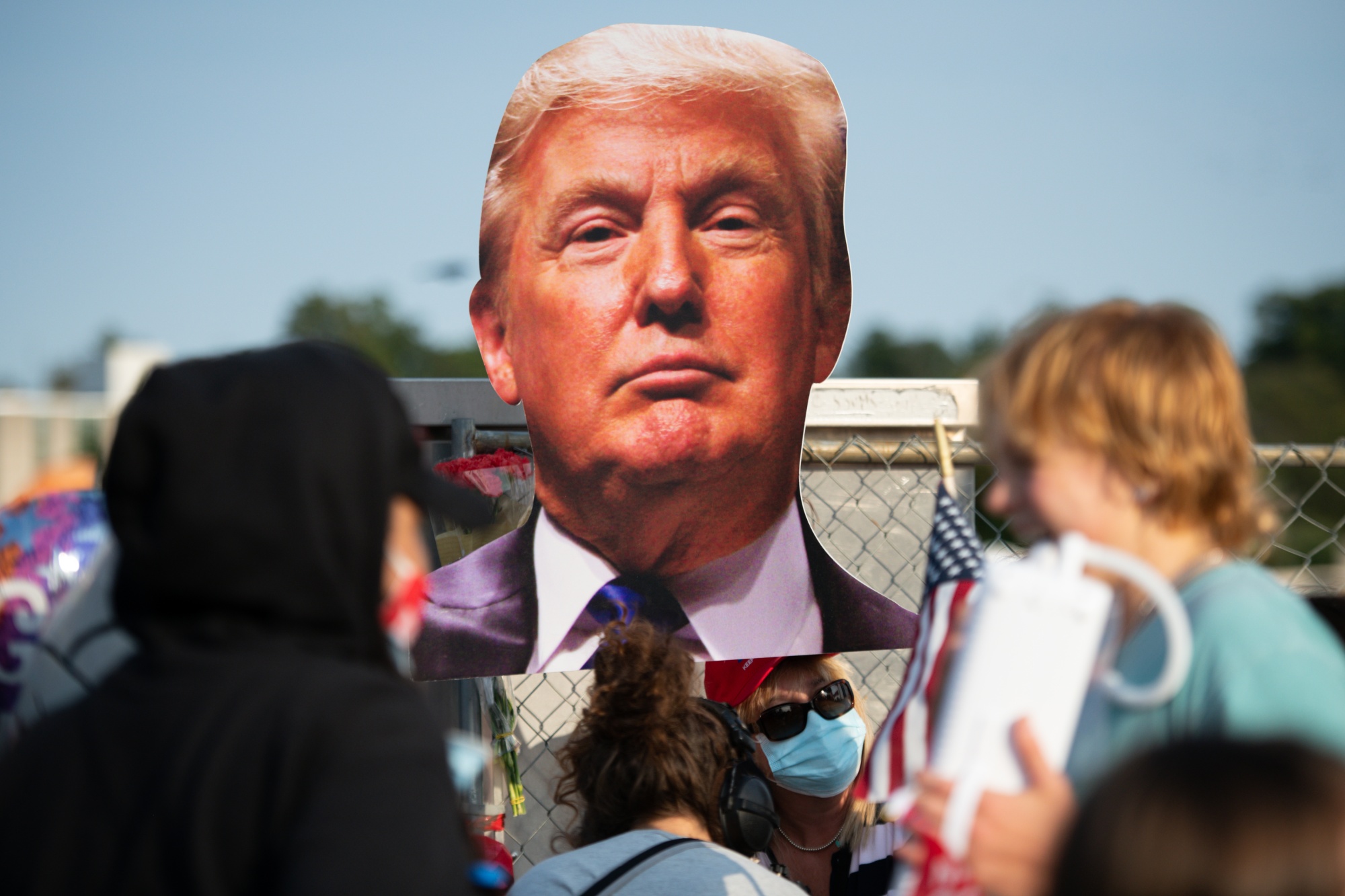 A cardboard cutout of U.S. President Donald Trump is displayed as supporters rally outside Walter Reed National Military Medical Center in Bethesda, Maryland, on Oct. 4.