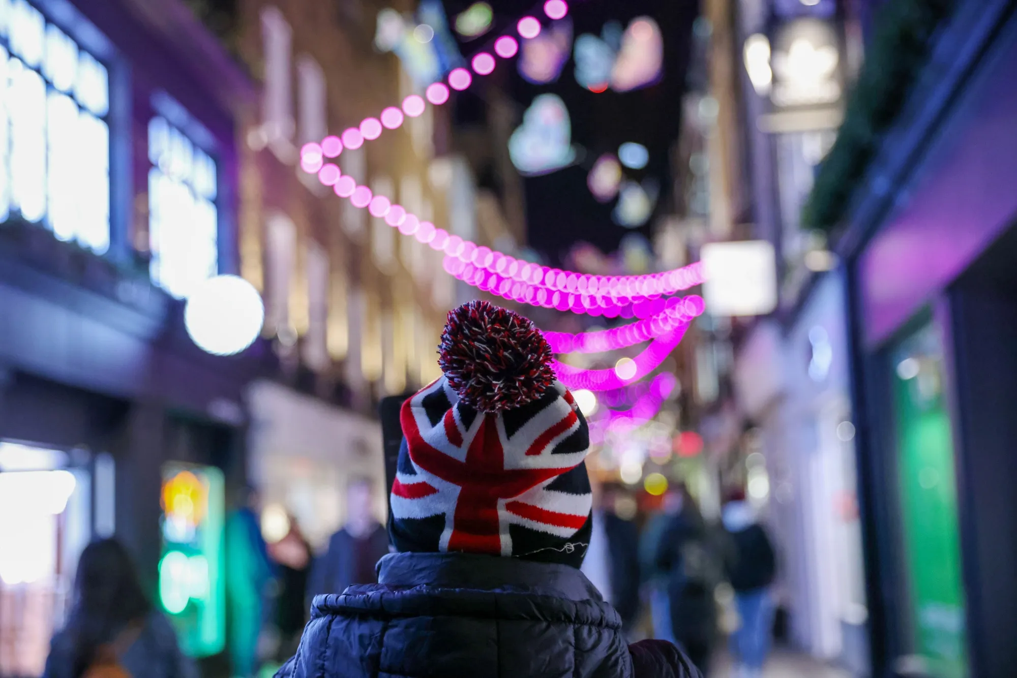 A pedestrian walks&nbsp;along Carnaby Street in London, U.K.