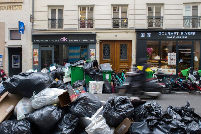 Garbage Mounts on Streets of Paris as Pension Strikes Continue