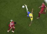 Brazil's Richarlison scores his second goal during the World Cup group G soccer match between Brazil and Serbia, at the Lusail Stadium in Lusail, Qatar, Thursday, Nov. 24, 2022. (AP Photo/Thanassis Stavrakis)