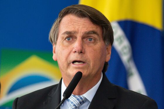 Bolsonaro Ousts Top Ministers as Pandemic Spirals Out of Control