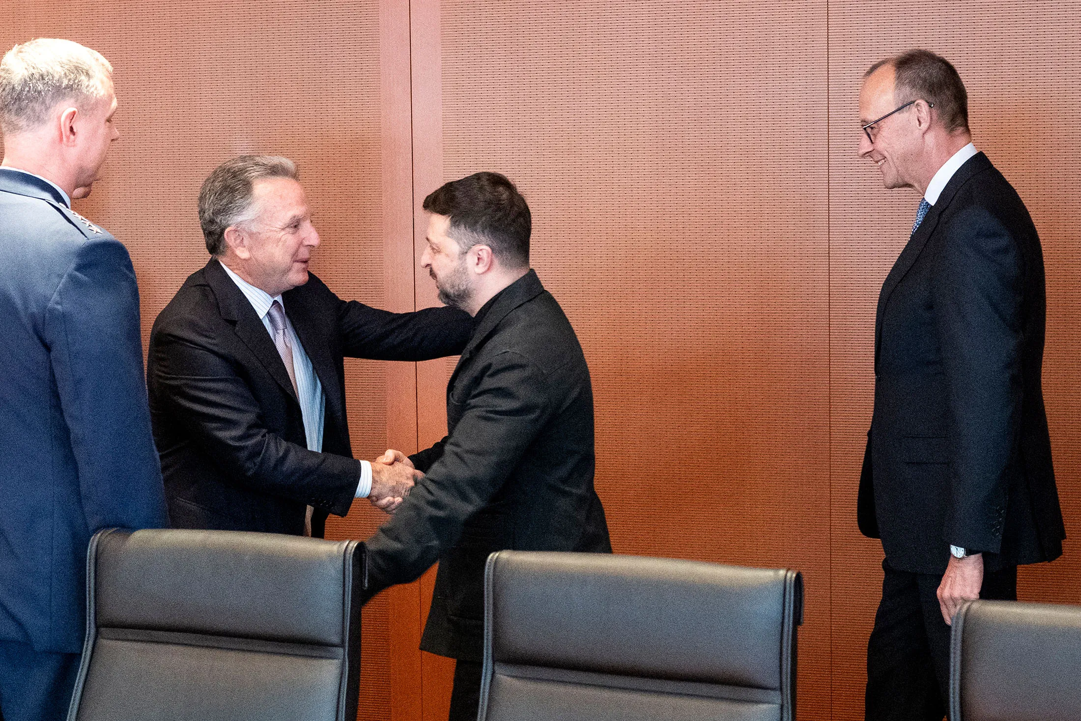 Steve Witkoff, second left, greets Volodymyr Zelenskiy at the Chancellery in Berlin, Germany, in this photograph released by the German Government Press Office (BPA) on Dec. 14.