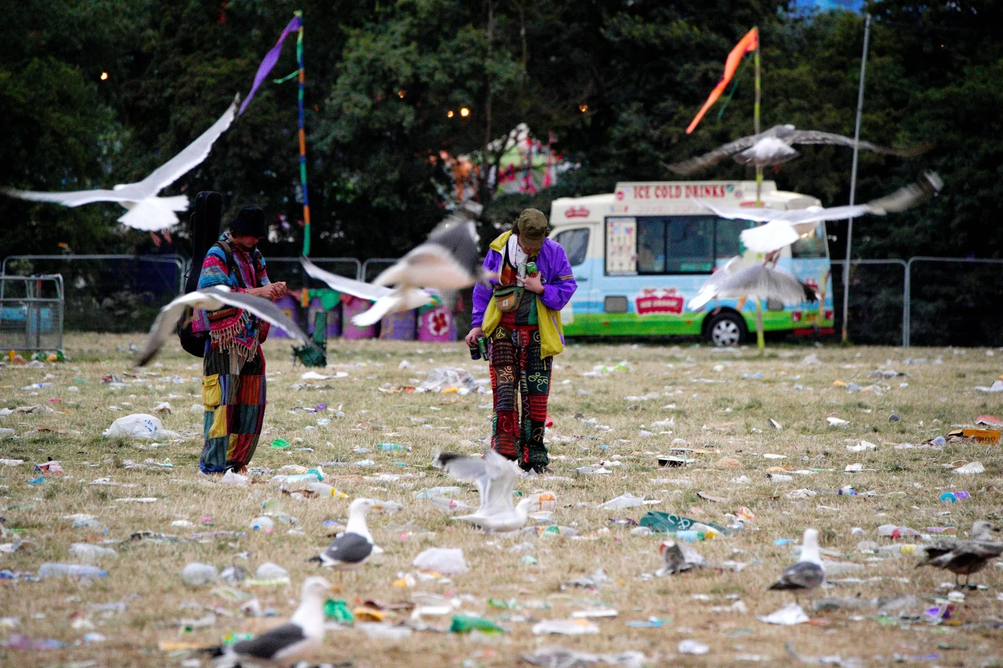 Gulls fly over waste left at Worthy Farm in Somerset as festival goers leave following the Glastonbury Festival on June 27.