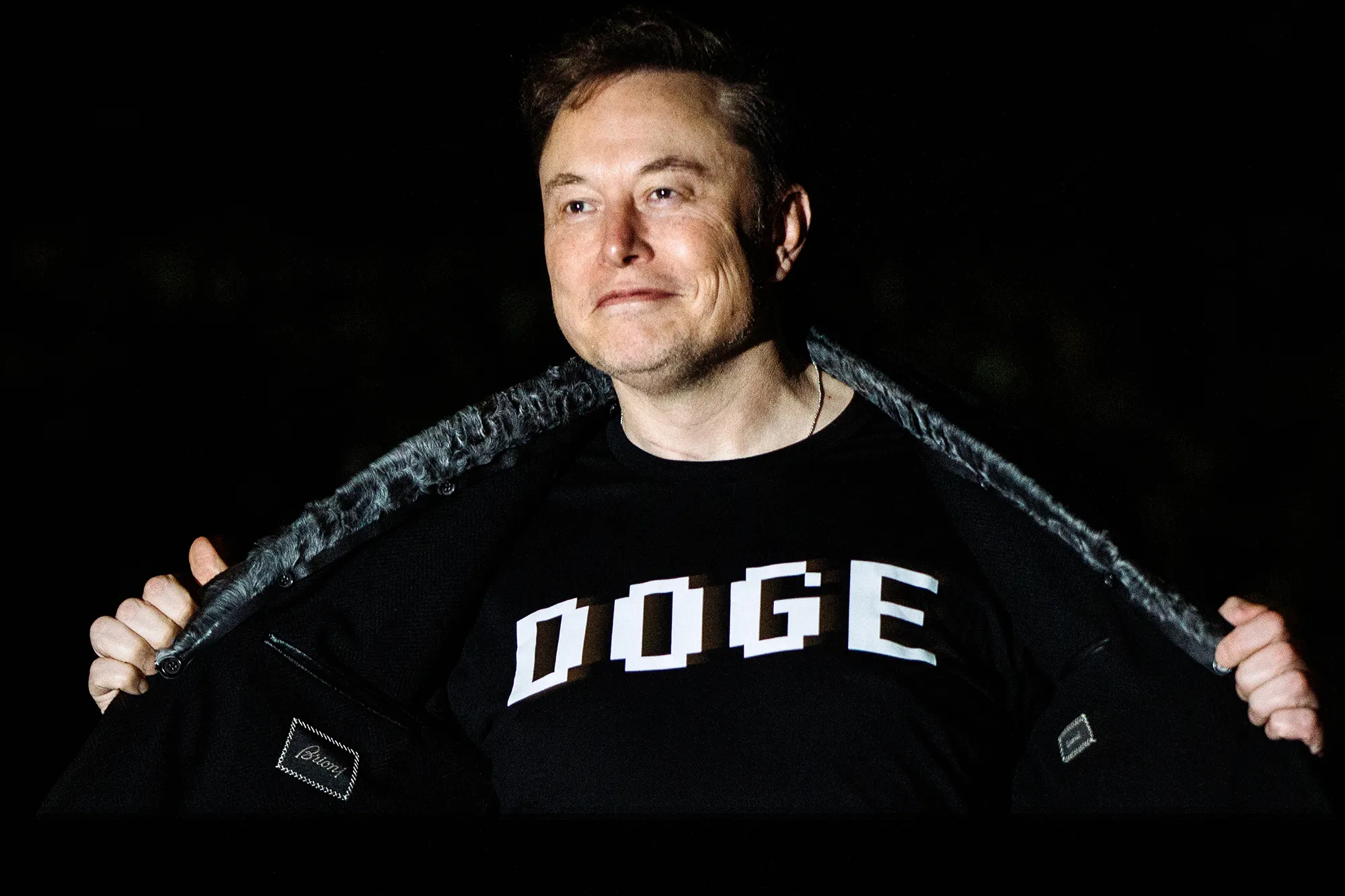 Elon Musk walks to the White House after landing in Marine One on the South Lawn in Washington on March 9.&nbsp;