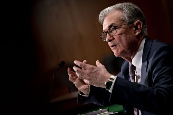 Powell Opens Door to Rate Cut on ‘Evolving’ Risks From Virus