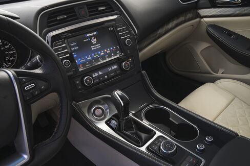 Come for the flat-bottomed steering wheel, stay for the stitched leather.
