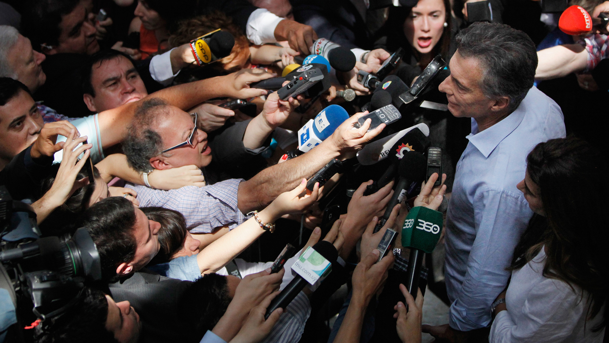 Mauricio Macri speaks with the press after voting on Sunday, Nov. 22, 2015 in Buenos Aires, Argentina.
