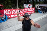 Demonstrators protest against Kinder Morgan’s Trans Mountain pipeline expansion outside of the G-7 finance ministers meeting in Whistler, British Columbia, Canada, on June 2, 2018.&nbsp;
