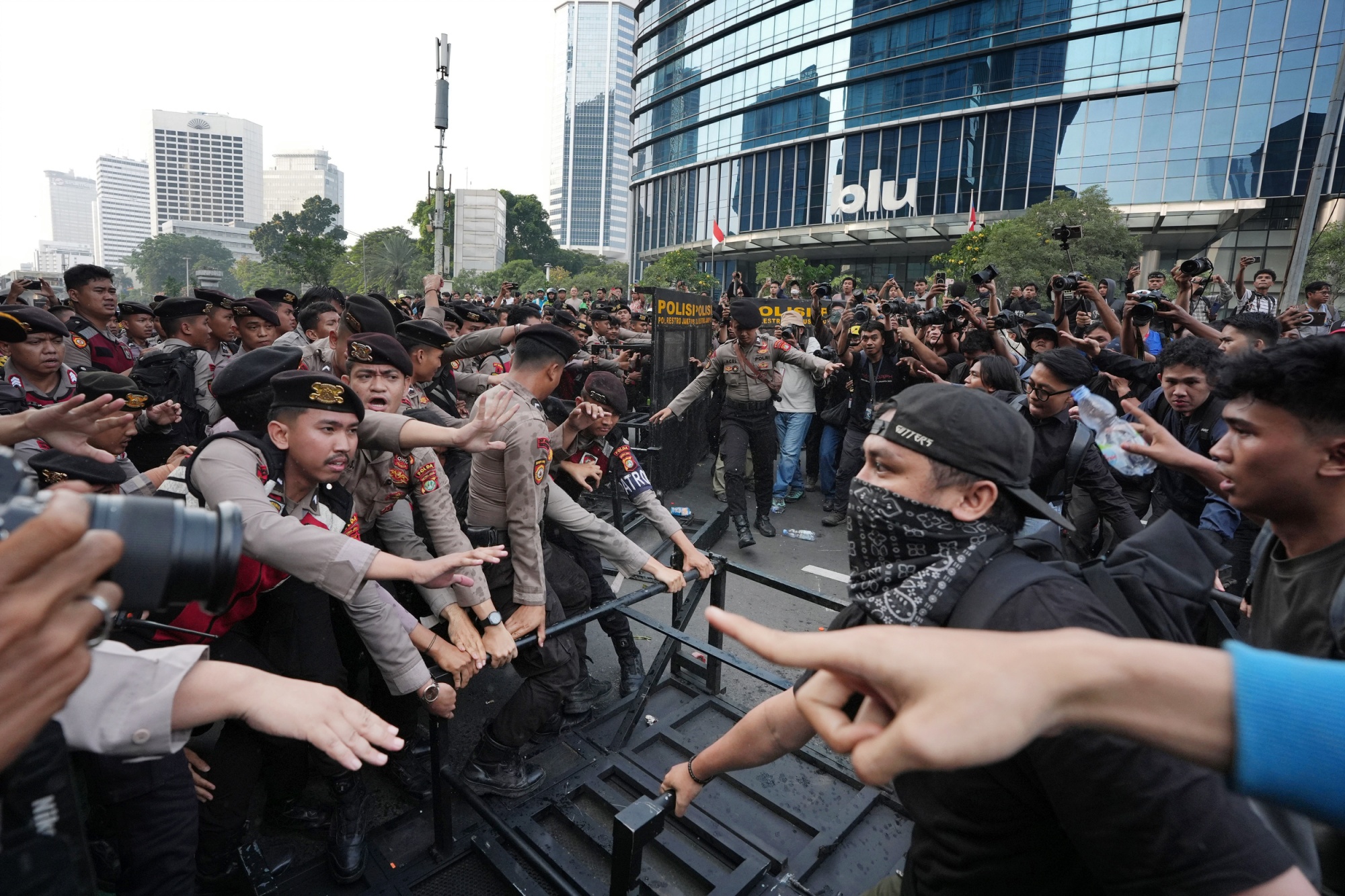 Demonstrators clash with police during a protest in Jakarta.