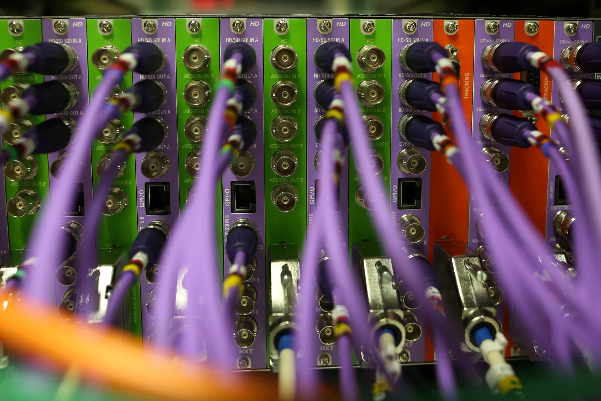Coaxial cables feed into a server inside a comms room at an office in London, U.K., on Friday, Oct. 16, 2015. A group of Russian hackers infiltrated the servers of Dow Jones & Co., owner of the Wall Street Journal and several other news publications, and stole information to trade on before it became public, according to four people familiar with the matter.