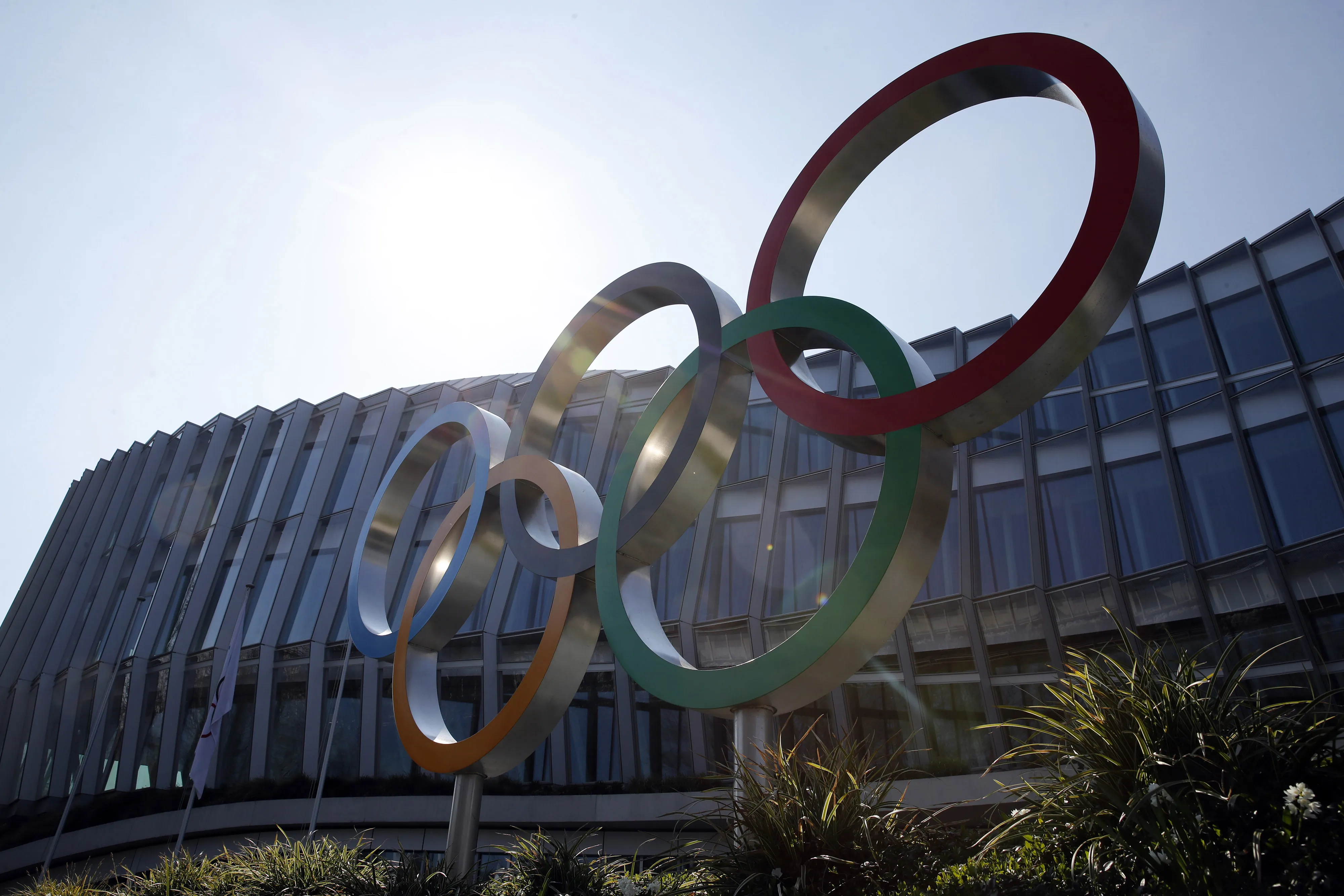The olympic rings stand outside the headquarters of the International Olympic Committee in Lausanne, Switzerland, on March 25.
