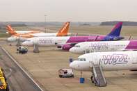 Airline Travelers as U.K. Scraps Pre-Departure Covid Tests for Vaccinated Visitors