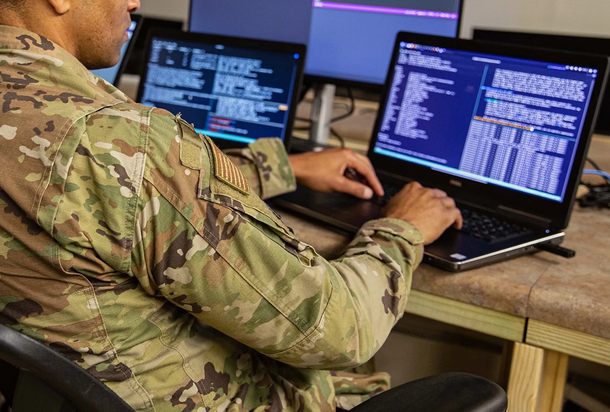 A service member with the 175th Cyber Operations monitors cyber attacks during Exercise Southern Strike at Camp Shelby, Mississippi.
